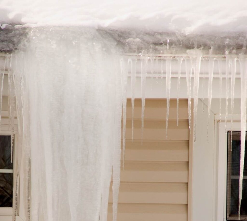 ice dam causing roof leaking in winter