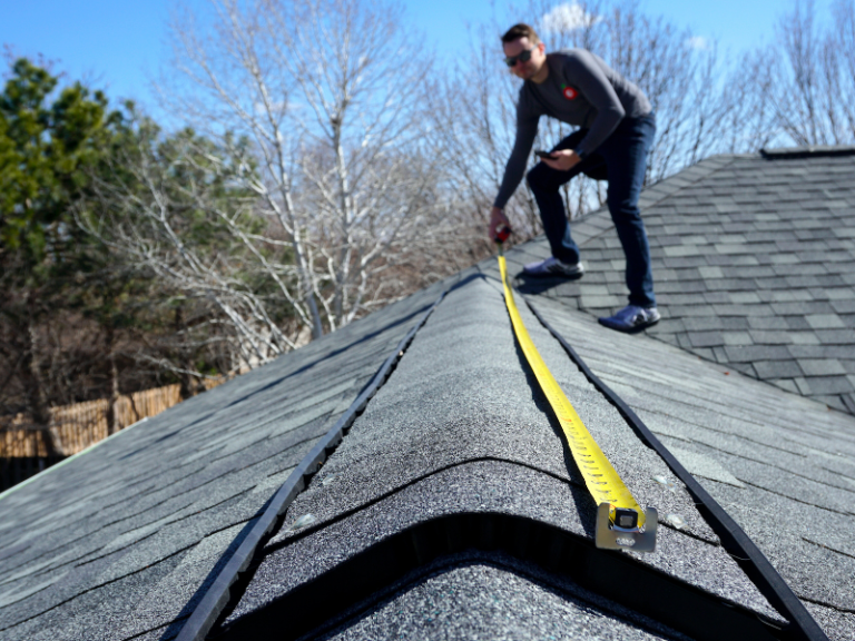 contractors measure roofs to prepare roofing estimates in Ocean County